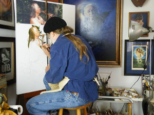 John Twohawks painting in studio